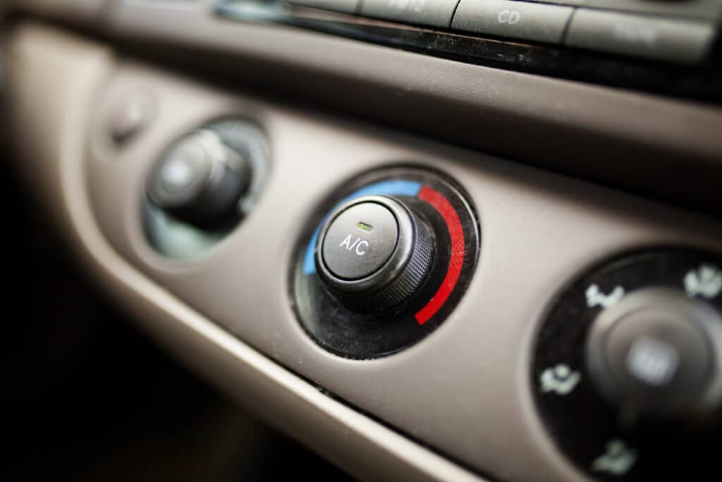 Why Does My Car AC Smell Like Vinegar? Here's The Reason